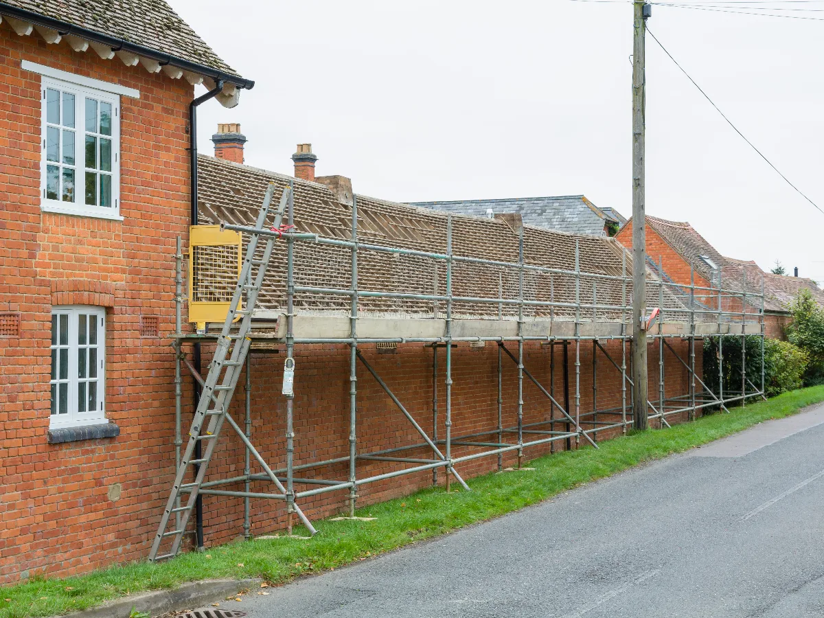 Cottage re roof on scaffold