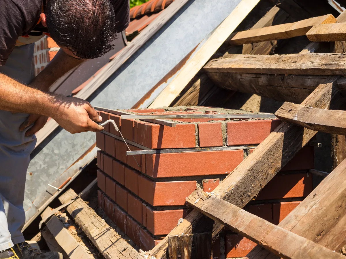 Oakcrest Roofing Ltd carrying out chimney repointing